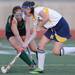 Saline's Caitlin Pellerin moves the ball past Huron's Sophia Vancouver during the first half at Saline on Thursday night. Melanie Maxwell I AnnArbor.com